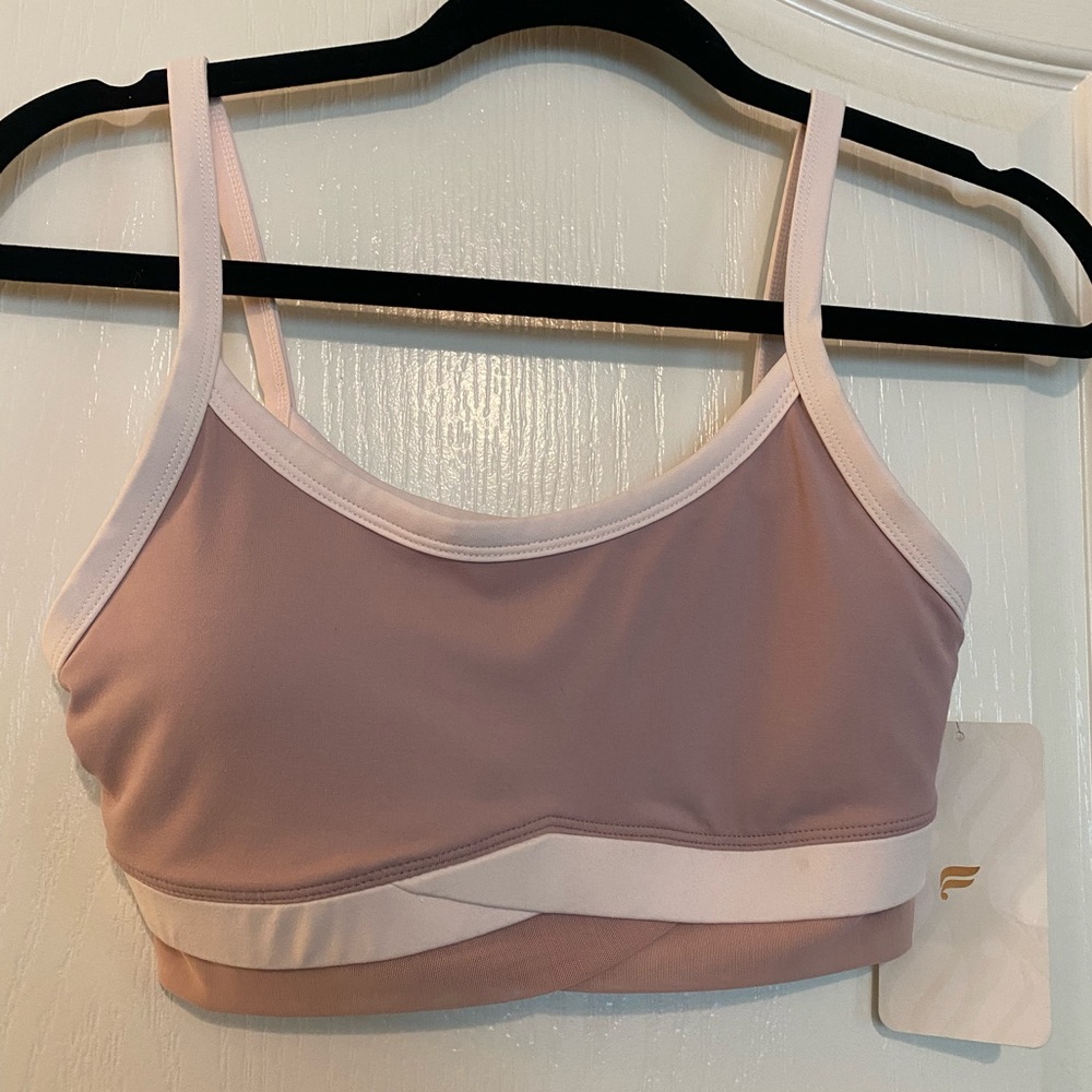 Fabletics light pink two-tone sports bra with mesh detail / medium support